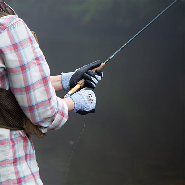 Doing fun hobbies like fishing while wearing the Level 4 Cut Resistant Gloves Cru553 Thin for comfortable fit and protection.