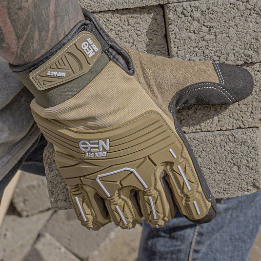 Mechanic Impact Resistant Gloves MG310 in Sand carrying heavy loads of concrete blocks making use of the synthetic leather reinforcement at each fingertip and palm ensuring its durability and longevity. 