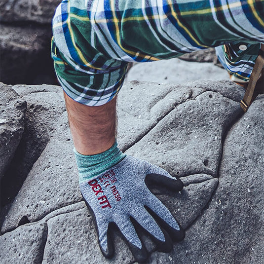 Using the Nitrile-Coated Work Gloves FN330 while hiking as it provides great grip on any surface while also being lightweight and protective.