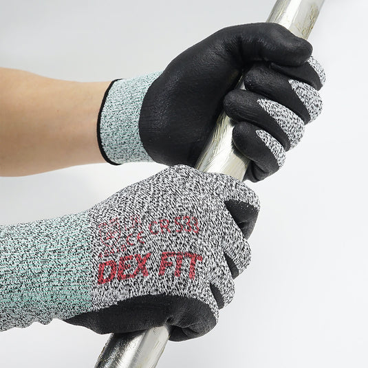 The Level 2 Cut Resistant Gloves CR533 and its foam nitrile-coating on the palm and fingertips providing superior grip while holding on a metal pipe.