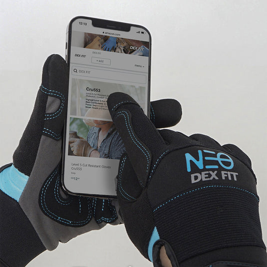 Wearing the Mechanic Premium Gloves MG310 while using a touchscreen device to show its three touchscreen-compatible fingers.