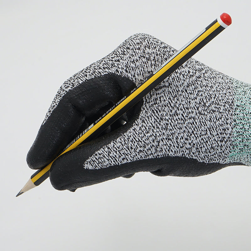 Load image into Gallery viewer, The Level 2 Cut Resistant Gloves CR533 holding a pencil, showing off its lightweight skin-like fit and maximum dexterity.
